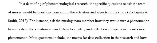 What specific questions would you ask the team during debriefing of phenomenological research