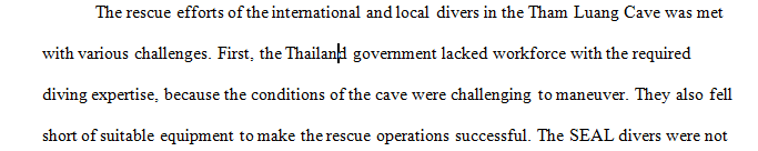 How did the physical environment of the cave affect the rescue plan