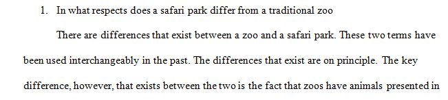 In what respects does a safari park differ from a traditional zoo